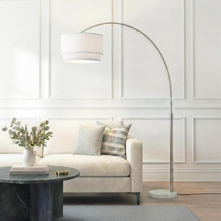 Brightech Mason arc floor lamp with marble base in a modern living room