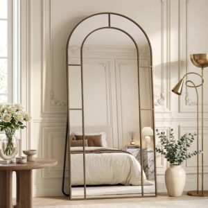 An Arched Bronze Mirror for a Softer Bedroom