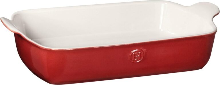 Emile Henry Modern Classics 13 x 9 inch ceramic baking dish in Rouge red with cream interior and side handles